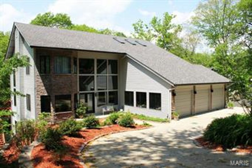 Stunning, 4 bed/5.5 bath custom architect designed home in a gorgeous setting. Thoughtful details are everywhere. An open concept main level features a double story great room, dining room and gourmet kitchen finished with Italian cabinetry, center island, granite counters, and stainless steel appliances plus main floor bedroom and bath…perfect for guests. Don’t miss the huge elevated deck! A study with private half bath is near the entry. Upstairs, are two en suites including a massive master with a private deck, double walk in closets with built ins and a Santa Fe Spa inspired bath with walk in shower and whirlpool tub.  The lower level features 12’ ceilings, another bedroom en suite plus tons of indoor and outdoor entertaining space, including a custom bar and outdoor kitchen. All this plus a 3 car garage! This is inspired living in the heart of Kirkwood. Exceptional.