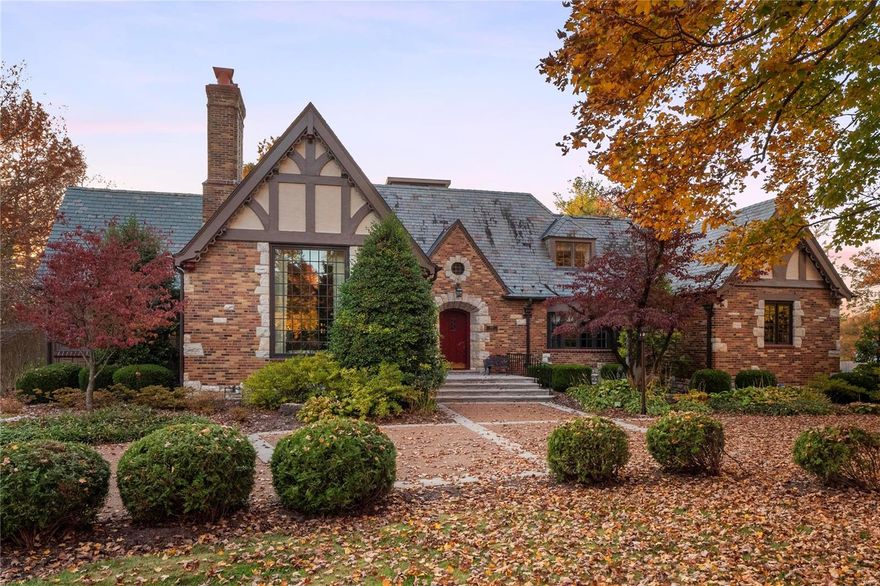 Easily recognizable as one of the most picturesque homes in Ladue, this authentic gabled English Tudor has been spectacularly maintained, restored & improved to perfection. All the original charm has been enhanced & echoed from the concrete trimmed aggregate drive to the quiet private flagstone patio. The barrel vaulted living room, formal dining room with bowed bay & shiny terrazzo floors compliment the additional rooms whose pitched ceilings are equally unique & romantic. The recent custom kitchen features luxurious surfaces, appliances & cabinetry. Magical owners suite with 21st century storage & luxury bath offers a sumptuous marriage of marble & warm wood cabinetry. The lower level is a WOW, deeply poured, with rec room, bar, office, exercise room, half bath & yet more space for entertaining. Every sightline in this home from room to room is a vision of architectural balance allowing for light to illuminate. A one of a kind home by any measure! No stone left unturned!
