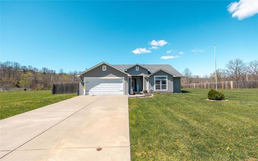 Escape to your own piece of paradise with this serene 3-bedroom, 3-bathroom home nestled on a 1.46-acre lot. Located just a short 15-minute drive from Fort Leonard Wood, this tranquil retreat offers the perfect blend of convenience & countryside living. Step inside  & be greeted by a warm & inviting ambiance, accentuated by the cozy gas fireplace in the spacious living room. The open floorplan creates an airy atmosphere, ideal for both entertaining guests. The heart of the home lies in the well-appointed kitchen, featuring a convenient breakfast bar, stainless steel appliances & ample cabinet space, making meal preparation a breeze. Outside, a spacious deck invites for outdoor gatherings in the expansive fenced-in yard. With meticulous maintenance & thoughtful design throughout, this peaceful home offers a harmonious blend of comfort, functionality & natural beauty. Don't miss the opportunity to make this idyllic retreat your own! Schedule a showing today!