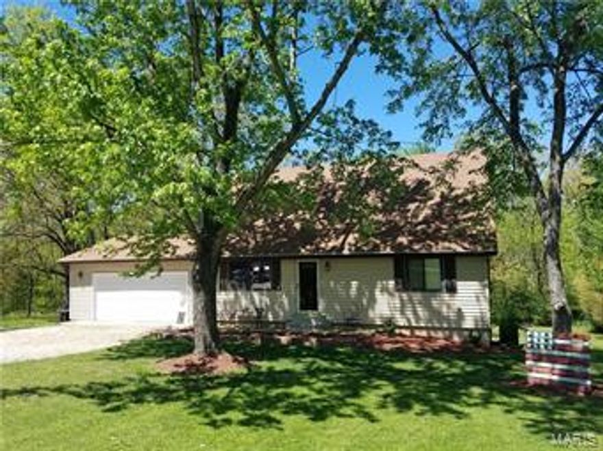 This home is located in the USDA eligible area for the USDA No Money Down loan to purchase this home!
Great updated 3 bedroom, 2.5 bathroom, 1.5 story home. 
Spacious open layout awaits you when you enter this home! The large kitchen offers ceramic tile flooring, plenty of cabinet and counter space as well as an adjoining breakfast room with convenient access to the large two tier deck overlooking the private back yard. Additional amenities include an updated bathroom with new vanity, new toilet and tile flooring, as well as spacious main floor master bedroom with the other 2 bedrooms upstairs, 2 car attached garage and lake privileges! This home is sure to please located on a large private lot! Seller is also in the process of having a new septic system installed!