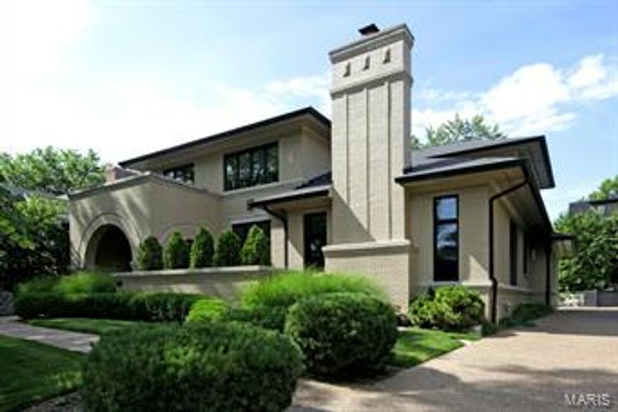 With a Mid-Century feel, the inviting front porch welcomes you to this extremely handsome all brick custom home with 3 levels of elegant yet comfortable living space.  Perfectly designed for today, this 4 BR, 5.5 bath home balances high ceilings and beautiful open spaces , ideal for entertaining.  2 story entry is host to a stunning wood& iron staircase that opens to the formal dining room and cozy den/office.   Euro style kitchen with granite counter tops, center island with seating and Viking appliances adjoins the spacious hearth room w/plasma TV &  eating area. Sunny LR w fireplace, wet bar, wine frig and French doors that open to  patio.  1st floor Master has a coffered ceiling, his/hers closets, luxury bath with double vanities, shower & whirlpool tub.  Upstairs are 3 bedrooms with walk in closets and loft with built-in bookcases.  Fin LL with full bath, rec room, exercise room and storage.  1st flr laundry, 2 car garage,  walking distance to schools, shopping and restaurants.