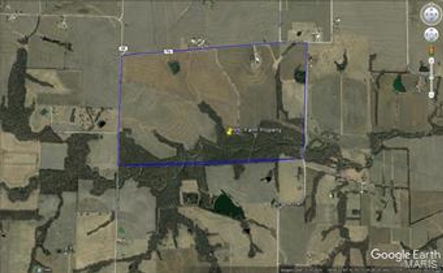 New Price!!!  Great farm property located Northeast of Wellsville.  Total acreage includes wooded hunting ground on the south boundary for hunting or recreational use.  Sale incudes all buildings 120 X 60+/- and grain/silo bins.  No equipment is included.  Property is currently leased and the lease is cancellable.  Tillable land terraced spring 2017.  Small pond in great condition.  Metal building and grain storage are in excellent condition.  Access to the property from paved Hwy PP.