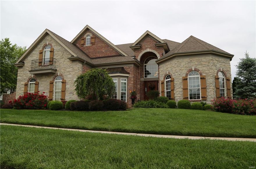 Spectacular, custom 6 bd/4.5 bth 1.5 story on .5+ acre lot in sought-after Eagle Crest Estates. 8000+ sqft of living spc. Grand Foyer leads to paneled Living Rm; coffered Dining Rm; 2-Story Great Rm w/window wall & gas fireplc; & Powder Rm. Gourmet Kitchen w/maple cabinets, granite & stainless appliances opens to Brkfast Rm w/bay; Desk; Hearth Rm w/fireplc & Laundry w/cabinets/sink. 1st flr coffered Master Ste w/Sitting Rm w/fireplc, custom walk-in closet & luxury bath w/jetted tub. 2nd Flr has balcony; lrg Loft; 3 bedrms; Shared Bath; Guest Bath & Bedrm/Craft Rm. W/O Lower Level w/Family Rm w/TV niche, Rec Rm, Wetbar, 6th Bedrm, Sitting Rm, Full Bath, Game Rm, & Workout Rm. Features: built-in bookcases; box beam ceilings; hardwood flrs; custom millwork; surround sound wiring; alarm; inground sprinkler, 3 zoned HVAC, pet fence, 3 car side-entry garage, low-maintenance deck, inground pool, waterfall, outdoor kitchen & professionally landscaped fenced yard! Top rated Rockwood Schools!