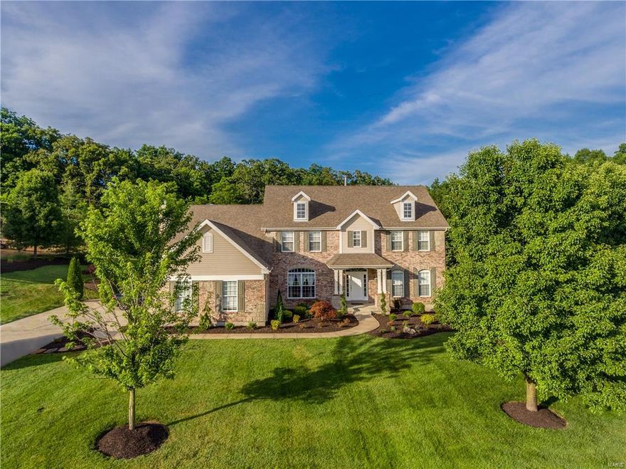 Bring an offer! Located on one of the most prestigious streets in Sunset Hills you will find this remarkable custom built home. Travertine entry hall that opens to the great rm & dining rm.  Sit by the fire and enjoy the custom cabinetry & ambiance in the great rm. The kitchen, breakfast & hearth rm offer open concept living space. You will love the gourmet kitchen w/ updated stainless Kitchen Aid app., island, granite ctrs & desk. The adjacent bkfst rm has a bay window that accommodates a large table and a walk out to the expansive deck. Relax by the fire & enjoy the view of the pool from the hearth rm. Main flr master suite w luxury bth & walk in closet. Upstairs you will enjoy the enormous family rm, den & 3 generously sized bedrms w walk in closets, one has an en-suite bath. Prof fin. L.L. w/ media rm, gym, & over-sized rec/ family ent. area w/ walk out. The outdoors is the place for fun w/ maint. free deck w/ salt water pool & landscaped yard. Close to hospitals & hwy access.