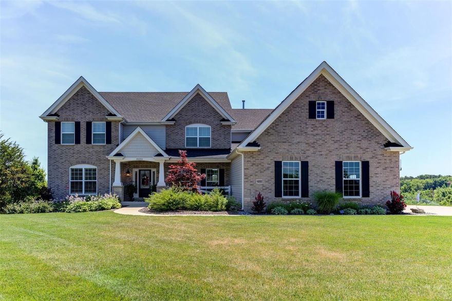 This stunning Pottery Barn 1.5 story home sits on 5+ beautiful, level acres with all the bells & whistles. Notice the lush, prof landscaping, covered porch, ext 3 car side entry.  The wall of windows in the great room w/gas fireplace provides plenty of natural light & an open floor plan.  Gourmet kitchen w/double stacked upgraded cabinetry w/glass fronts, Silestone counters, glass pantry w/Elfa system, GE Café SS app, gas range & Advantium microwave.  Vaulted hearth room has stone gas fireplace.  Master suite is located on the main floor, includes Elfa storage in closets, dual sinks, soaking tub & separate shower.  Upstairs are 3 nice sized bedrooms, 2 share jack n jill bath, the upper family room has surround sound & French doors.  Outside enjoy nature & wildlife on the patio, chicken coop w/chickens & firepit.  Other features are 8’ doors, extensive millwork, deep pour & rough in LL, zoned HVAC, 9’+ ceilings, 6’ windows, in Rockwood Schools, minutes from Wildwood Town Center.