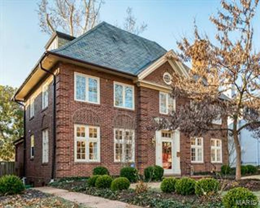 Built in 1916, this home has classic style and 2015 livability. Prepare to fall in love. Enter the foyer and see the winding stairway and the many, many architectural details. The formal living room with fireplace and built-ins adjoins the walnut paneled family room with French doors to a brick terrace and landscaped yard. A bank of windows let the sun shine in the updated kitchen that is a cook's dream with white custom cabinets, Thermadore gas cooktop, double ovens, an alcove for reading or a desk and a contemporary bath with double sinks and shower in marble. Two additional bedrooms and another newer bathroom are on the second floor. Follow the stately staircase up to the third floor and find two more bedrooms and a full bath. It is a perfect space for teens or guests. Walk to Forest Park, Washington university, schools, shops from your home in the wonderful Hillcrest neighborhood.