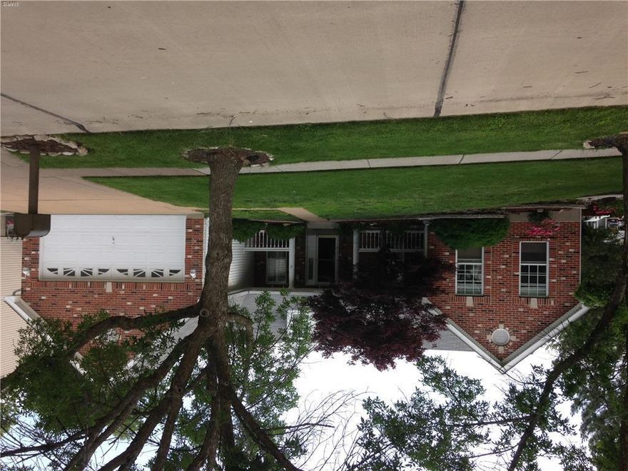 Wonderful 2 owner home is sought after neighborhood.  This home sits on a nice corner lot with a walkout basement.  Boasting an open floor plan, the updated kitchen with Silestone counter tops look out to the Great Room and Dining Room.  The center island is large enough to prepare and serve food while entertaining friend and family.  The Master Suite has a large walk-in closet and a Master Bath that has a separate whirlpool tub and shower with double sinks.  The vanities in both bathrooms are 36" tall.  The hall bath has newer ceramic tile floor with updated fixtures.  All the bedrooms are good size with ample closet space.  The deck off the back of the house can be accessed from both the Kitchen and the Great Room.  There is an open staircase to the unfinished basement,  but there is a finished room that could be used as an office, sleeping room,etc.  The full  basement could be partially finished and still have plenty of room for storage.  This is a great home in a desirable area.