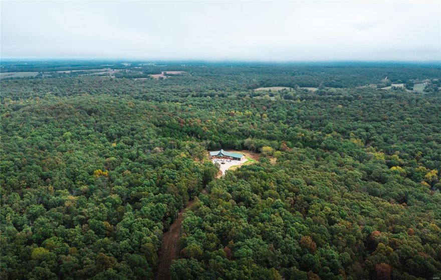 Searching for your own slice of heaven? It can be found nestled in over 300 acres of lush evergreen and hardwoods enveloped by rolling hills and a year-round running creek sits High Point Lodge. This 5672 sq.ft. lodge-style home has been completely renovated and is the epitome of rustic elegance. Enter the property through a pipe entry and automatic gate. A 1/4-mile chat driveway leads to this 6-bedroom 4 full bath lodge that is large enough to entertain yet has the feel of cozy cabin. The spacious open floor plan on the main level boasts a grand kitchen, a magnificent fireplace, master bedroom and two full baths. The basement has generous space for a game room, 5 bedrooms 2 full baths and walk out. Attached 3 car garage accessible through a utility/mudroom. The property's established ATV trails create the perfect for family or retreat that enjoys nature. This is a must-see property that won't disappoint!