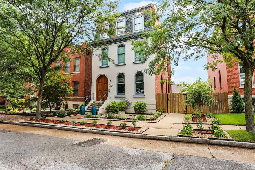 This newer open concept home allows you to make your home your sanctuary. A traditional exterior meets modern sophistication inside, starting with the front mohogany doors that lead you to a steel & mohogany staircase that seems to float from the lower level to the 3rd floor. The main floor and hallways have gleaming walnut floors throughout. Lots of windows keep the open 1st floor bright with multiple seating & dining areas and a large open chef's kitchen. In the rear is a drop zone and a half bath. The 3rd floor is a spacious Primary suite w/large walk-in closet features Arch views. You will love the spa-like bath w/double showers & whirlpool tub. The lower level is flexible open space, used as a den, gym, there is a home theater & storage room. Outside find perennial planting beds, large patio space, lap pool & spa, gas fire pit & gas connected grille. The 2 story garage holds a large WFH office, full bath, & heated & cooled garage. This home was featured in St Louis Homes Magazine! COOL: 14 SEER+