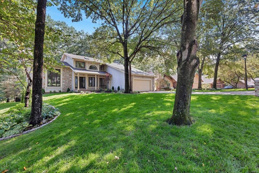 Lakeside living in this exclusive lakefront property. Breathtaking views, serene surroundings, the promise of a tranquil retreat. Immerse yourself in nature's beauty. Your dream lifestyle awaits – seize the opportunity to make it yours.  Immaculate, fully renovated home w/oversize main level deck & LL patio facing the lake. Vaulted great room w/WB FP. Custom kitchen w/lake view, crown molding, under cabinet lighting, touchless faucet, Corian counters, breakfast bar, pantry, new appliances. Breakfast room w/large bay windows. Extra MF dining room or office. Utility room w/walk in closet. Master suite w/2 big walk-in closets, private deck, bath w/oversized shower, soaking tub, 2 sink vanity.  Deep pour LL FR walks out to patio. Exercise area w/padded floor & mirror. Storage area w/shelving & 48" exterior door. Professionally installed garage flooring. Stone retaining wall & walkway to lake. Renovated boat dock. Freshly sodded yard w/in-ground sprinkler system. Seller Paid 2/1 Buydown.