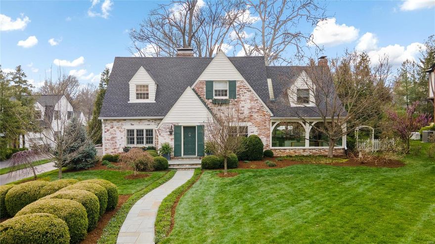 Nestled in the heart of Ladue, this enchanting cottage-style home is within walking distance of Clayton restaurants and shops. Enter timeless elegance and gracefully move to the heart of the home—the kitchen/family room—collectively designed for casual family gatherings and heartwarming good times. French doors open wide so guests flow freely to the patio for starlit entertaining. Every space reveals a story of classic style, tasteful renovation, reflecting the home’s rich history and livable lifestyle. Enjoy the comfort of newer systems and exciting amenities, 2-car garage, and easy parking for guests and family alike. Second floor boasts a great layout with kids enjoying their own hang-out space and parents with primary designed for privacy and relaxation. But, the charm doesn't end there - tucked away in the landscaping and trees is a delightful garden cottage offering a secluded retreat for a calm or creative getaway. Welcome home to your dream come true. 8 minutes to the airport