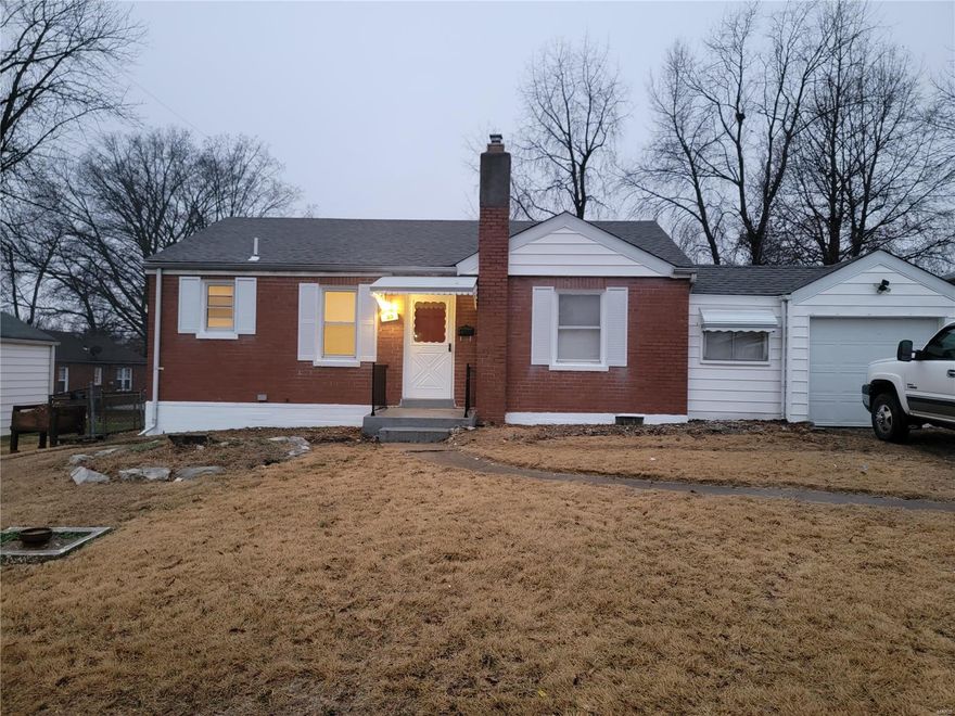 AVAILABLE NOW.  Updated 2 bed 1 bath brick home with 1 car attached garage and level fenced yard.  Hardwood floors, new kitchen with appliances, central air, updated bathroom and lighting.  rent includes trash and sewer bills.  Tenant pays electric, water, gas, and cuts lawn.  This home will go fast.  Free application must be completed prior to showing by all proposed occupants over the age of 17.  we do not accept housing vouchers on this home.