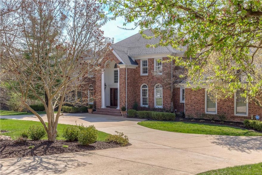 Spectacular elegance throughout this stately 5 bedroom home. Impressive two story entry foyer leading into the two story great room with fireplace, wet bar. The spacious main floor master suite has two walk in closets, updated cabinetry and flooring. The bright kitchen offers newer appliances, granite counters, two pantries and hardwood flooring. Opens into the breakfast and hearth room with fireplace and hardwoods. There is a built in study area along with a butler area and wet bar. T-staircase leads to the upper 3 bedrooms each with a full bath. All bedrooms and great room has new carpeting. and  Main floor laundry with 1/2 bath off the kitchen. Lower level offers the 5th bedroom and 1-1/2 baths. Family room with two sets of french doors walks out to the pool. Wet bar with newer cabinetry, appliances and granite counter. Private fitness room, and additional game room. Composite deck leads to pool area, covered patio and lush landscaping. Three car garage with coated floor system. Additional Rooms: Mud Room