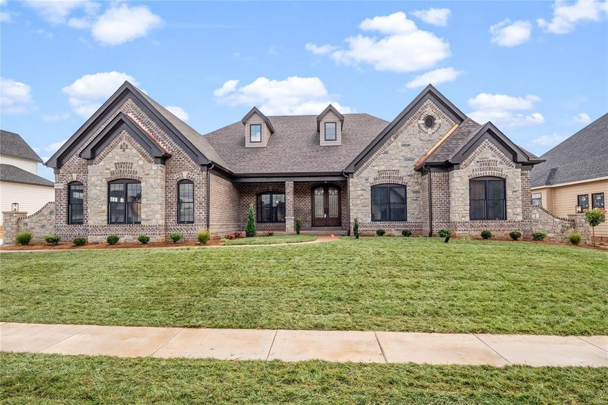 Newest Ranch Home Under Construction "The Kelly".  Purchase Now and make your selections!!! Built by one of St. Louis' premier hands-on builders Claymont Development, LLC-Wesley J. Byrne. A spacious 4br, 3.5ba 1-story w/appx 5600 sq ft of finished living space. This European Cottage elevation features a generous finish of brick and stone. 10' First Floor ceilings and an inviting 12' story great room w/gas fireplace and Atrium stairs. Gourmet kitchen w/custom cabs, stainless steel appliances & granite. The Vaulted Hearth Room is the perfect place to relax & unwind. Master suite w/ 2-pc crown & coffer ceiling, lux bath w/whirlpool tub & sep.shower. MF w/two beds with a J&J bath. LL featuring a Media Room and #4 bed and full bath. Four-car side entry garage, 10' LL found., screened-in deck & cedar sun deck, additional patio below. UNDER CONSTRUCTION!