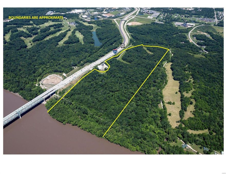 78.586 Acres: Prime Acreage fronting the Katy Trail and Missouri River just minutes from St. Louis County. Road frontage along I-64 & Hwy 40 is 2,500 ft. and 900 ft. on Wolfrum Rd. This very special property has a multitude of potential uses, providing a gravel access road from Wolfrum Road to high rolling meadows surrounded by dense woods. Current zoning allows for a small office/warehouse development, residential, or other uses allowed in High Tech zoning. Outstanding location and highway access, with good road frontage on Wolfrum Road. This is the duplicate listing of 230337280.