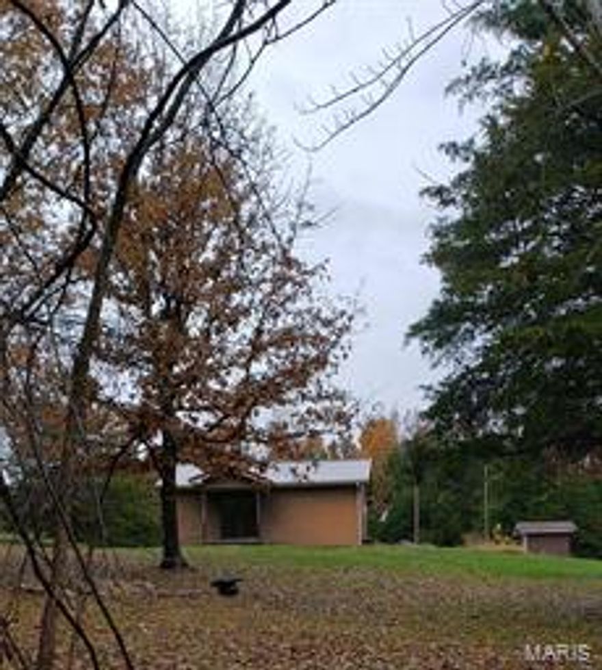 Great hunting cabin on 10 acres.  Call today to view this property.  Property is being sold as is.