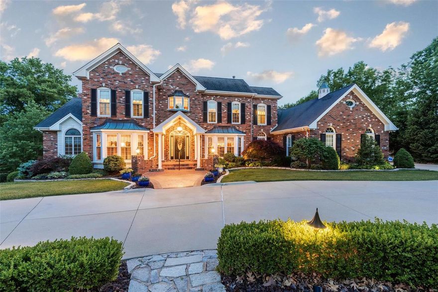 Stunning custom built executive brick 1.5 story home with heated saltwater pool situated on 1.3 parklike acres. Living large at over 5,000 square feet, 5 bedrooms, 4 full, 2 half bathrooms. Two story entry and great room, formal dining room and office. Beautiful kitchen features large island, 42" oak cabinets, vaulted breakfast room connects to the composite deck that overlooks the backyard. Main floor primary suite- large bay window, walk-in closet, spa bathroom with newer glass shower. Upstairs, additional primary suite, 2 bedrooms connected by a Jack & Jill bathroom. Sun-filled walkout lower level family room, rec room, 5th bedroom and full bath perfect pool changing area. Spacious pool deck, lush landscaping, screened in porch plus pergola. Concrete circle driveway, 3 side entry car garage, lawn irrigation, 3 HVAC systems,2 fireplaces, custom moldings, Hardy board siding, covered front porch with curved brick stairs- Welcome home!