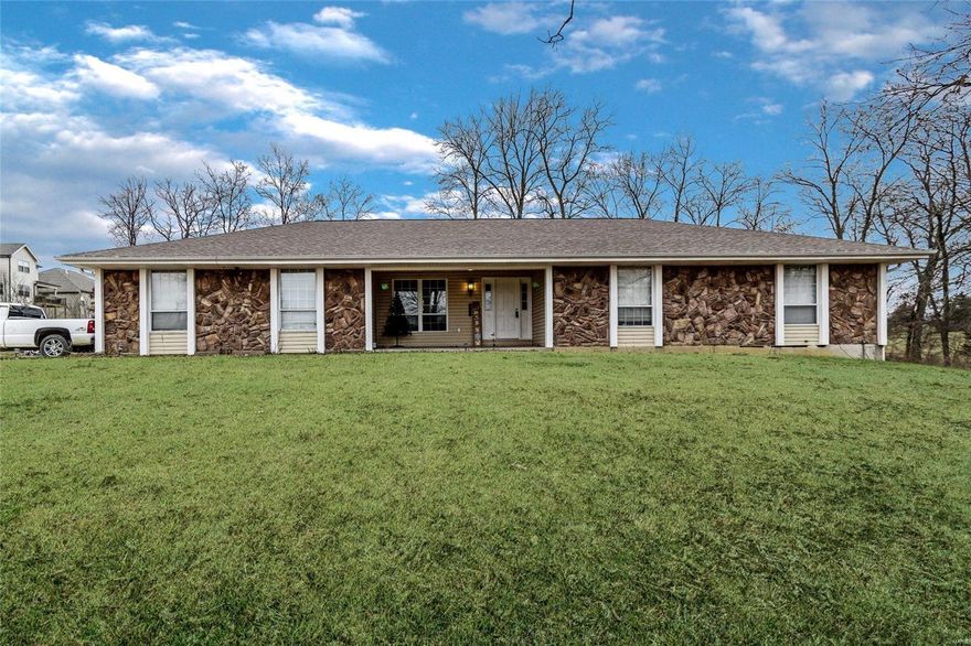 Looking for acreage in unincorporated St Charles County? Here is 3+/- acres with a 2300 sq foot home offering, main floor laundry with full bath off the over sized two car garage, open spacious, eat in kitchen with planning desk and breakfast bar that overlooks the sunken, vaulted  living room. Beautiful stone fire place with wood burning insert, surrounded by built in book shelves. separate dining room for the extended family dinners. Three large bedrooms with walk in closets. The lower level is partially finished, tons of storage area and walks out to the beautiful acreage, just a few steps and you are at the stocked pond. 
So many extras with a great location just minutes from Wentzville.
Few repairs are in the process of being completed, floor transition strips and touch up painting.