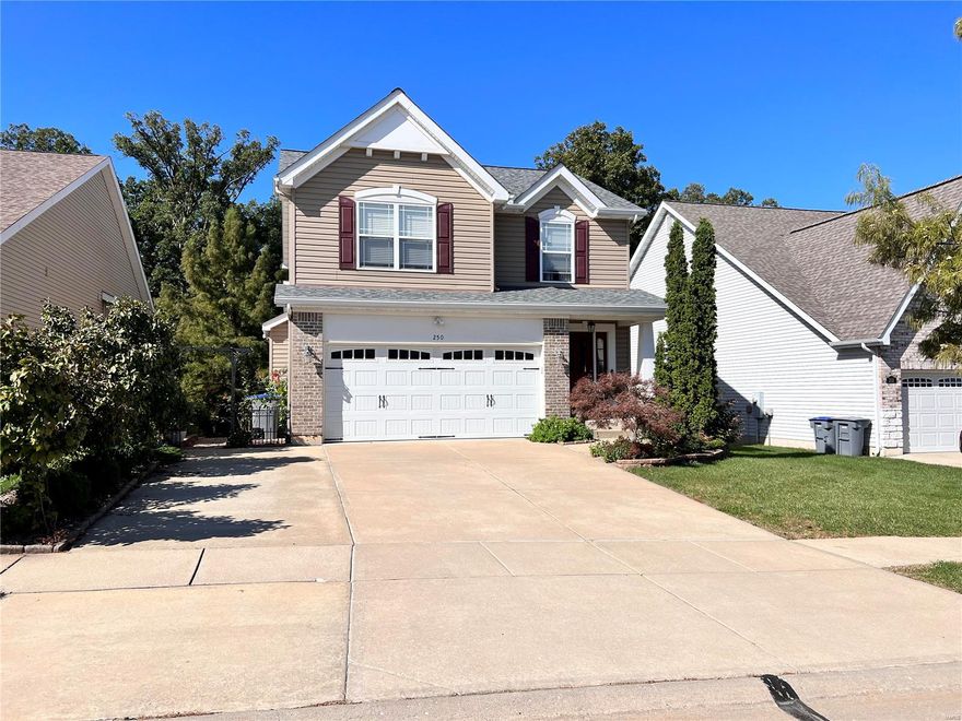 Adorable 1.5 Story home with 2 car garage and oversized driveway. Amazing great room with 2 story ceilings. Kitchen flows into the great room. New Luxury Vinyl Wide Plank Floors on entire Main Level. Main Floor Master Suite with Vanity, walk in shower + Walk in Closet. Walk Up Stunning Staircase with Rod Iron Spindles and New Carpeting. Upper level has 2 Bedrooms, Full Bath and Loft perfect for home office + New Carpet. Fresh Paint throughout the Main & Upper Level. Finished Walkout Lower Level with Family Room, Kitchenette, Electric Fireplace, Full Bath with Soaking Tub and Sleeping Room. Walkout lower level has covered Patio. Deck overlooks woods/trees perfect for privacy. Professional landscaping surrounds the home plus walkway from front to back. Low Maintenance exterior with Newer Roof, vinyl siding, soffits & fascia, gutter guards. Minutes from Alligator's Creek Aquatic Center. Main Floor Laundry.