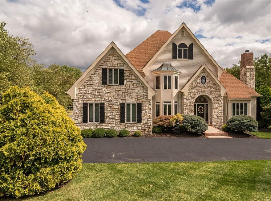 Old world elegance has been captured in this magnificent French chateau-like home. Exquisite details & charm abound. Elegant entry greets you w/ a curved stairwell & opens to a breathtaking 2 sty great room w/ wall of windows & fireplace.  Wonderful views of perennial gardens & woods on the 3.09 lush acres including a cascading waterfall & conversation area. Spacious formal dining room for entertaining. Main floor master bedroom suite & study that adjoins the MBR w/ fireplace & lots of bookshelves. Gourmet kitchen featuring granite, large island, 5 burner gas cook top & beautiful custom cabinetry. Cozy hearth room w/ beamed, soaring ceiling, built-in bookcases & fireplace. Lovely screened in porch off kitchen. Newer finished LL w/ wet bar, rec room, family room, workout area & walk-out. Plenty of storage.  Featured in St. Louis Magazine & designed by a foremost interior designer. Unique & exceptional treasure. Minutes to Wildwood Center.