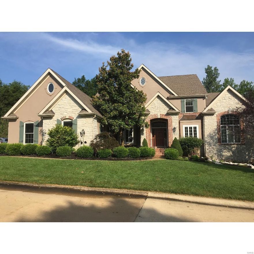 Stunning custom-built 6 bed, 6 bath home overlooking the 17th fairway, gorgeous curb appeal with professional landscaping and stone/stucco/brick exterior.  The interior features many upgrades including a dramatic 2-story great room, beautiful hardwood floors, custom built-ins, gas fireplace and amazing year-round views through the floor to ceiling wall of windows.  Gourmet kitchen features granite counters, custom cabinetry, ceramic tile, stainless steel appliances, breakfast bar and prep sink.  Hearthroom features a custom stone wall with gas burning fireplace, open views and natural light.  Master suite features 12ft coffered ceilings, recessed lighting, elegant crown, his & hers walk-in closets & sinks, whirlpool soaking tub, and walk-in shower with seating.  The second floor features 4 large bedrooms with walk-in closets and ensuite bathrooms.