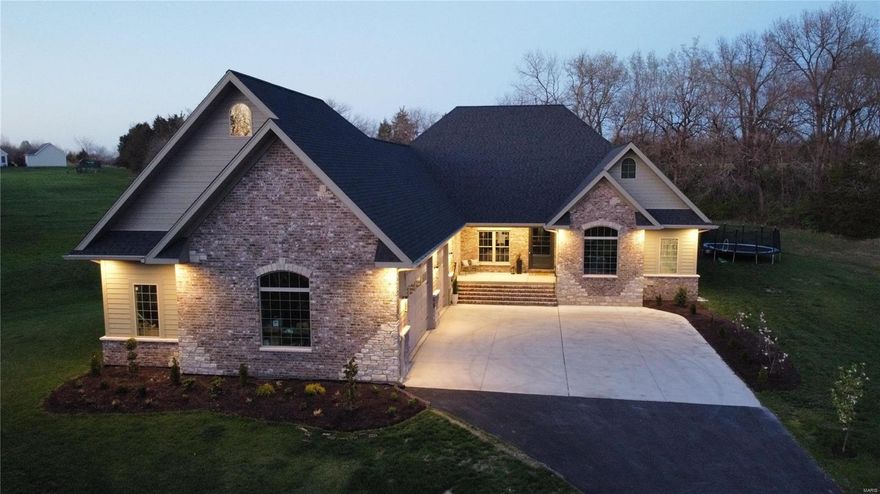 Private Oasis with Mature Trees! 2 year New, 3,105 sq. ft.  Ranch on 3 Acres, tucked away in a desirable area in Southern St. Charles County!  3,723 Sq. Ft. of Finished Living Space! Quality & Craftsmanship abound in this 3BR/3 Full/3 Half Bath, with 3 Car Garage (1,729 sq. ft., heated/cooled), Custom Ranch w/LL Partial Finish.  Interior Features: 10', 12' & 14' CEILINGS, 8' INT./EXT. DOORS, Plank Floors, Pella Windows, Crown Molding, 7 1/4" Base, Coffered/Boxed Beam Ceilings, Window Transoms, Fireplace's (Great Room & Covered Patio), Recessed Lighting, LP Smart Diamond kote siding, LED Lighting, Study/Office & MORE!  Gourmet Kitchen Features, Quartz counters, high-end WiFi appliances, walk-in pantry, Breakfast Room & Formal Dining.  The Master Suite offers a lavish retreat w/Doors to Back covered Patio, Tub/Tiled walk in shower, His/Hers Vanities, Walk In closet, Custom Shelving. 2x6 Walls, Interior/Exterior Insulated walls, Energy Efficient HVAC Zoned, Tankless water heater & More!