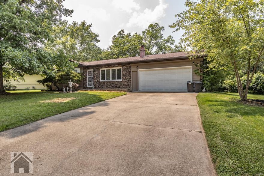 Move in Ready in the City Limits! This 3 bedroom, 3 bathroom ranch house has a partially finished basement on a flat lot in the Waynesville school district. Step into the large living room with wood floors and a full rocked wood burning fireplace. The kitchen and dining room features ceramic tile floors for easy clean up, new back splash and white appliances. The master bedroom is carpeted for comfort with two closets. There are two carpeted guest bedrooms on the main level as well. The full hall bathroom features ceramic floors, lots of cabinets and a shower. Downstairs entertain family and friends in the spacious family room with ceramic tile floors. There is a guest bathroom and a storage room with shelving in the basement as well. Outside enjoy the privacy under the covered back patio and flat back yard. Call to schedule a showing today!