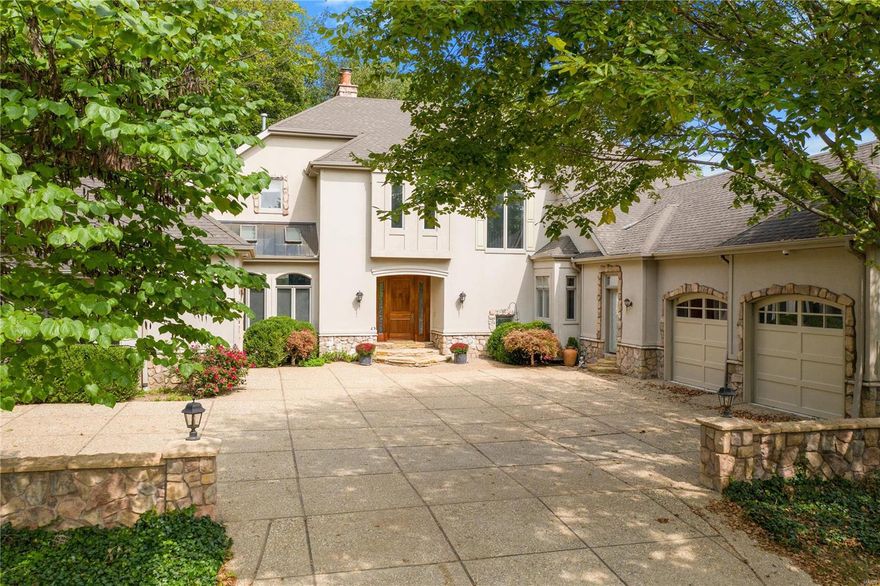 Spectacular home in the award winning Ladue school district is conveniently located on a quiet cul-de-sac. The foyer opens to a 2-sty great room w/ an expanse of windows to view your own private oasis. The Master suite features his and her baths and two walk-in closets. A large dining room w/ seating to entertain and is easily accessible from the kitchen. The  breakfast and hearth are warm and inviting and provides access to the deck and gazebo. The kitchen is a chef's delight with an abundance of cabinets,granite counters,  dacor oven, breakfast bar. Two additional en-suite bedrooms are upstairs with a balcony overlooking the Great Room. The LL is a masterpiece. The office features warm wood built-ins and fireplace. The fitness room can pull double duty as a craft room and the  family room with  built-in bookcases, fireplace and a full bar is a perfect place to entertain. The   Home provides an abundance of storage as well. All this plus a 3+ garage.