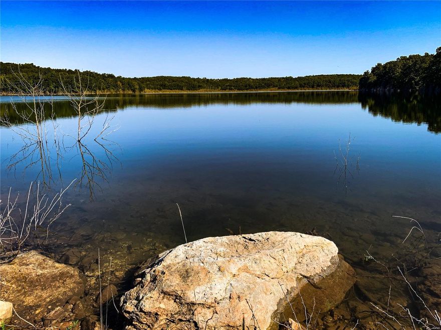 Have you ever dreamed of owning your own private lake retreat? Now is your chance with this breathtaking 92-acre lake known as Bray Lake.

Just minutes from Rolla, Missouri this crystal clear lake is surrounded by 492 rolling acres of timber, creating a very private setting to build the retreat of your dreams. With multiple potential building sites and utilities onsite the only challenge you will face is picking which building site is the one for you!

For the outdoorsman, the property is home to abundant wildlife including whitetail deer and turkey… not to mention the hours you can spend on the water boating and fishing on the lake.

This truly is a rare opportunity to own sure a pristine property with a lake that is over 60 years old.