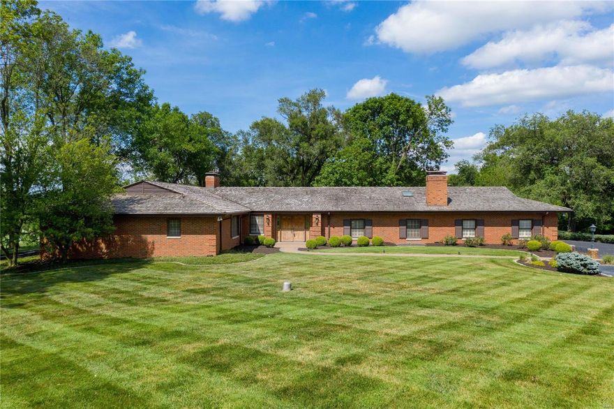 Once in a lifetime opportunity! Ranch style home situated on a 1.6+ acre lot with stellar views of Forest Hills golf course and pond. Enter to find the dining room with crown molding and access to the patio. The living room also features access to the patio to enjoy the spectacular views. The spacious family room boasts wood floors, skylights, and a wood-burning fireplace. The kitchen has ceramic tile flooring, center island, granite countertops, a walk-in pantry, Sub Zero refrigerator, and adjoins the breakfast room with a door to the patio. Master suite with 4 closets for an abundance of storage and full bath with tile floor and a sunken tub/shower combo. 3 additional bedrooms, a Jack & Jill bath, and a private bath on the main level. The finished lower level features a family room, rec room, half bath, and 2 walk-in closets. Additional features include 3 car side entry garage, zoned HVAC, cedar shake roof, views of 4 golf course holes, and much more! Home being sold AS-IS.