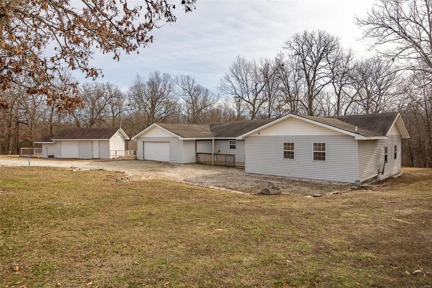 Get ready to fall in love! This gorgeous 10+ acre property, possibly hobby farm, has so much to offer! As you are approaching the home, you will love the open field in the front with highway frontage. This would be perfect for horses, cows, and the back half of the property is wooded. The home is very spacious with over 2100 sq. ft, 3 bedrooms (possibly 4) and 2 full baths. As you enter the home, you will find a sunken living room that is very large and open and a kitchen to off to the side with stainless appliances. The master bedroom suite is off the living room and features a nice size onyx shower. Down the hallway you will find the laundry room, office/flex space, a second full bathroom and the other 2 bedrooms. There is a 2 car attached garage, as well as a 3rd detached. Don't forget the huge slab that could easily be the foundation for a new shop, a large pole barn with plenty of room for all your hobbies! Public river access nearby and a short drive to I44, this one is THE ONE!