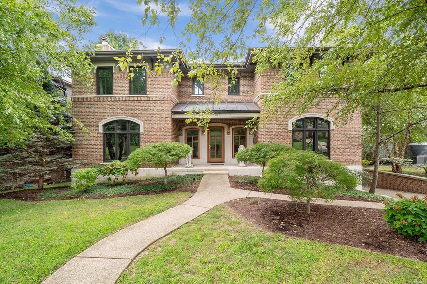 Impressive Italianate style 2 story, full brick, with exquisite limestone trim, meticulously designed w/superior materials and artisan-quality craftsmanship, nestled in this Prime location of Clayton Gardens. Formal dining room hosts Walnut floor w/accent tile, elegant stone portal transitions to the fabulous hearth room, which is adjacent to the breakfast and wet bars, Chef's Kitchen, stained cherry cabinets, Dacor range, stainless countertop w/an island contrasted w/open shelf, natural cleft slate, convection oven, warming drawer, NEW built-in stainless refrigerator. Stately living room boasts Walnut floor, fireplace, built-in shelf. Sophisticated m/floor study w/wood ceiling beams. Steel staircase w/hardwood treads lead to the 2nd floor. Primary bedroom features a barrel-vault ceiling, walk-in closet, En suite luxury bath w/ two vanities, jet tub, dual shower w/refined hand-laid tiles. Additional bedrooms w/wood floor. Jack and Jill bath, full bath, 2nd floor laundry. W/out fin LL. Additional Rooms: Mud Room, Wine Cellar