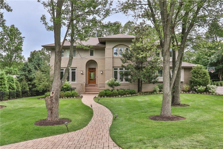 Recent Price Adjustment - Ladue Schools! See the 3D floor plan. Over 5300 sq. ft of total living space. This home is nestled at the end of a cul-de-sac of a private tree lined lane in a neighborhood that is friendly and welcoming.Once you walk inside you notice the open floor plan is perfect for entertaining & includes both formal and informal spaces.The great room adjoins the kitchen and features built-in bookcases & a gas fireplace. The eat-in kitchen includes a hearth room, breakfast area, large island with seating, high-end stainless appliances plus a large walk-in pantry. Upstairs you will find a gracious master suite, 3 more large bedrooms, a bonus rm & an upstairs laundry. The lower level doesn't disappoint w/multiple areas to entertain & play plus two extra rooms that could be used as bedrooms plus a full bath & a storage room. The backyard is a private oasis with a two year old salt water pool and spa with natural stone coping and Ipe wood decking. Truly resort worthy. Additional Rooms: Mud Room