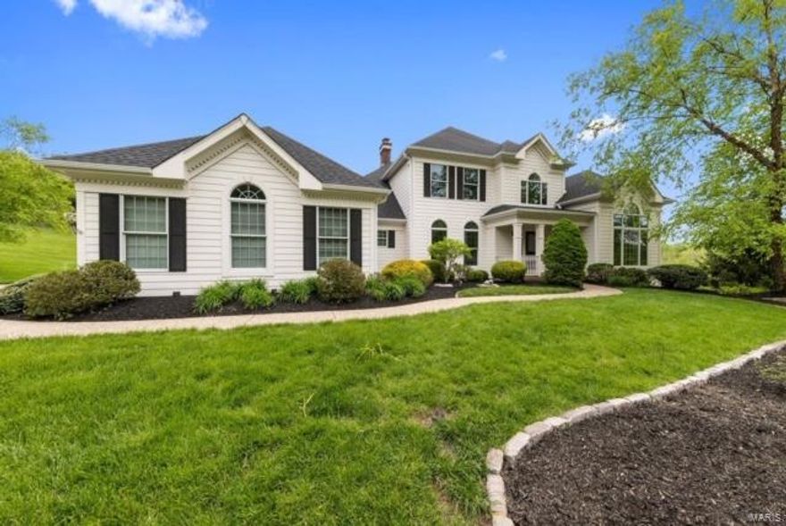 Situated on a private, wooded lot in desirable Greystone, this majestic 1.5 story awaits! Greeting you is a well-manicured level landscaped 1acre lot with a stunning home that boasts over 6500sf of total living space. Grand 2 story entry foyer leads to elegant dining rm & study/den. Great room is complimented by extensive millwork, fireplace & spectacular view of sprawling deck that overlooks a private, park-like yard. Vaulted & sunlit hearth rm adjoins 3 window bayed brkfst rm which inspires entertaining. Connoisseur center island kitchen equipped w/ Dacor SS appliances, granite, custom cabinets, brkfst & wet bar + butler pantry. Main floor master suite is complete w/ gorgeous lux bath. 3BRs/2 baths upstairs; incl a Jack-n-Jill. The basement is stunning; large living space with stacked stone gas fireplace and refreshment center w/ dishwasher & fridge. A Theater Room that seats 10, Upscale Billiards Room, Weight Room/Gym, 2 Additional Bedrooms, an Infrared Dry Suana and SteamShower.