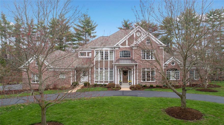 Poised in an exclusive enclave, centrally located, is this luxury, all-brick manse. Overflowing with natural light, this home features outstanding architectural details including paneled walls, moldings, and built-ins. 2-sty entry, flanked by the den and DR, opens to the GR with gas fp, bar area, and a sweeping floor-to-ceiling bay window. Off this space is the gourmet kitchen with an expansive center island, wood beam ceiling, high end appliances, and a copious amount of cabinet and countertop space. The kitchen opens to a hearth room and a vaulted FR with breathtaking views of the back patio and back yard. Main floor MBS boasts an opulent bath with separate tub and shower and a private sitting room. The UL features 3 large bedrooms with fabulous closet space and 2 full bathrooms. More living space in the finished LL offering a 5th bedroom, bath, fitness area, possible theatre area, and small kitchenette. Minutes from highways, hospitals, shops and dining, this home really has it all! Additional Rooms: Mud Room