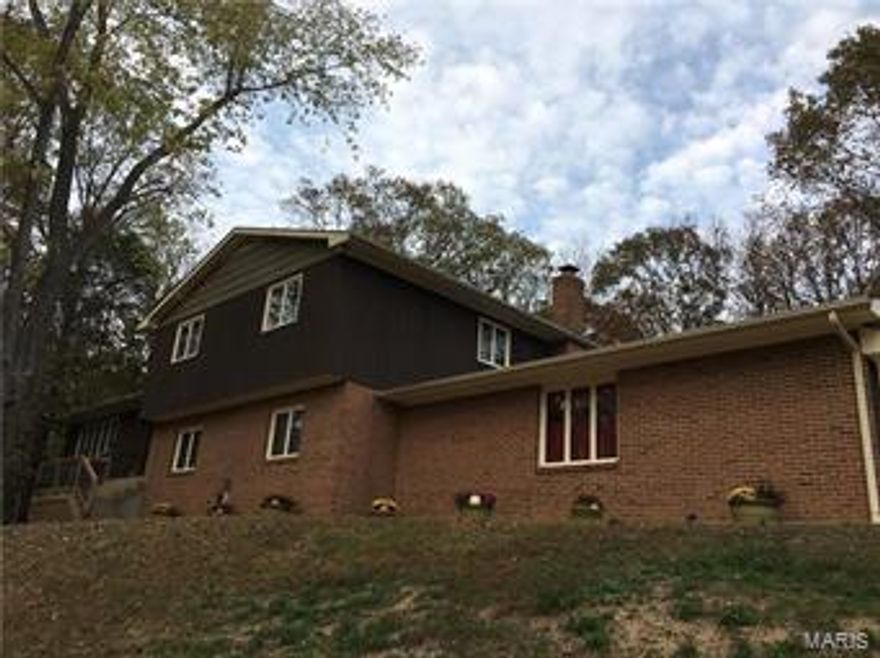 *NEW ROOF*  *NEW CARPET*  *HOME WARRANTY*  Spacious and private, this well-cared for family home sits on 1.6 wooded acres with EASY ACCESS to 100 and 44.  Fresh new carpet throughout the living room and bedrooms, updated kitchen with new counters and sink, this 4 bedroom 3 bath home has an office, den, a family room, ample storage and bonus rooms and a 3 car garage... there is room for every one and every activity!   With a new roof and painted exterior in 2015, and new retaining walls and landscaping this year, the hard work has already been done for you, PLUS, the Seller's are offering a Home Warranty for your peace of mind.  Come enjoy almost 3000 square feet of living space in the Washington School district! Additional Rooms: Mud Room