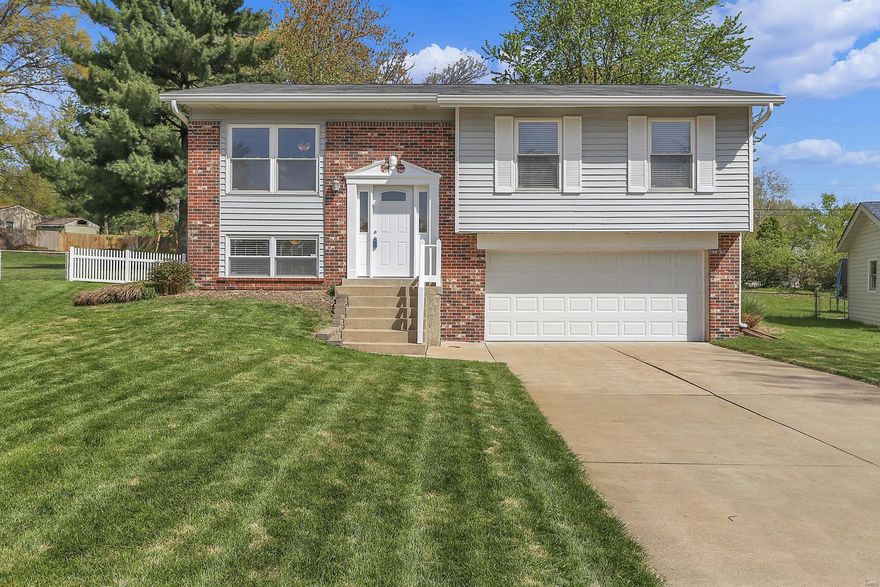 Beautifully maintained 3 bedroom home in the highly sought after Parkway South School District. Open floor plan with lot's of windows on both levels keeping it light and bright. Wood floor throughout the main living area and all bedrooms. Kitchen has updated granite counter tops, custom cabinets, tile back splash, stainless steal appliances and door out to your maintenance free deck overlooking the huge level back yard great for entertaining with plenty of space to spread out. All 3 bedrooms on the main floor! Master bedroom is a great size and 2 additional bedrooms are a good size as well - all have ceiling fans! Update full bath on the main with ceramic tile surround and granite vanity top! Lower level has a large rec room, additional sleeping area and an updated half bath! Still plenty of room for storage and a 2 car garage! Within walking distance of Manchester's Schroeder Park & Aquatic Center. This home is a MUST SEE and is MOVE IN READY! (Swing set excluded from sale)