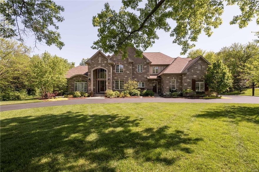 Beautiful 1.5 story home situated on a gorgeous 1+acre lot in Frontenac. This pristine home has a stunning interior with marble entry foyer, wood floors and wonderful architectural details. Approx. 6,000 sq. ft. on main & upper levels plus approx. 3,289 sq ft. in the finished walk out lower level. Luxury main floor master suite with deluxe bath. Second floor features a loft and 4 additional bedrooms each with private bath. Gourmet kitchen has custom cabinetry, granite counters, breakfast bar, center island with prep sink, 6 burner Viking range, Sub-Zero refrigerator and walk in pantry. The walk out lower level has spacious rec room, media room, sleeping area, full bath, second laundry room and French doors leading to the pool area. Enjoy entertaining in the park like back yard featuring the 8 yr. old Pooltron saltwater pool, and patio area with wood burning fireplace. Additional features: Inground sprinkler system, 4 car garage, 2 laundry areas, alarm system and central location. Additional Rooms: Mud Room