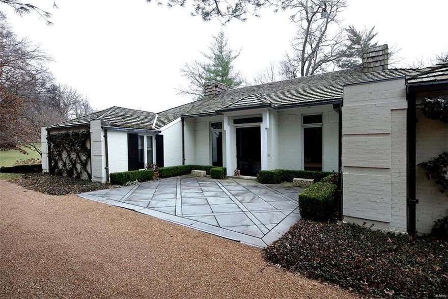 Enjoy the peace & serenity of this wonderful 1.5 story on gorgeous lot in a quiet cul de sac street.Sleek entry foyer captures the tone of the understated elegance throughout.Formal living room w/fireplace & gracious dining room have an abundance of natural light which compliments the present owners fresh young decor.LR & DR opens out to the deck & salt water pool offering fabulous opportunities for entertaining.The kitchen has top of the line appliances including SubZero drawers/refrigerators, Gaggenau cooktop/ovens & granite counters.A hearth room w/gas fireplace & built-ins is the perfect family gathering spot & opens out to the deck. The first floor also has a private master bedrm suite with access to the outside, a guest bedrm suite, powder room & MFL & plenty of storage. 2nd floor includes 2 bedrooms, full bath & family room loft area.2 car oversized gar & separate storage room.Landscaped gardens,deck,a pergola, pool & tennis/sport court makes this the perfect retreat for anyone!