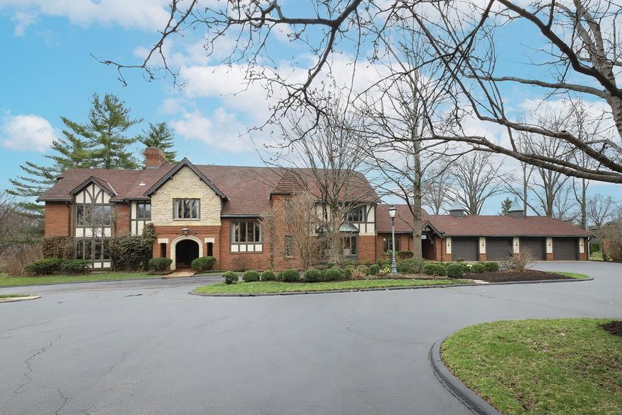 Magnificent 2-Story English Country Manor Estate, boasts 5 Bedrooms, 8 Baths (5 full /3 half), and 10,900+ Sqft of living space, designed by renowned Architect Ralph Fournier - known for his innovative and modern designs, nestled on 3 picturesque acres in the prestigious, private gated community of Country Life Acre, in the heart of Town and Country, known for its large, wooded lots and spacious homes with its residents working to maintain the area's natural beauty, and sense of community. From the moment you drive up to this house, and walk through the solid wood door, flanked by custom stain-glass side panels, you will be speechless. Stunning hand-crafted moldings throughout, blending Old World craftsmanship with today’s modern amenities, to show off this home’s architectural details. Additional features include: elevator to all floors, zoned HVAC, alarm and irrigation systems, an oversized 4-car garage, and a huge driveway that can accommodate a fleet of cars - just to name a few!