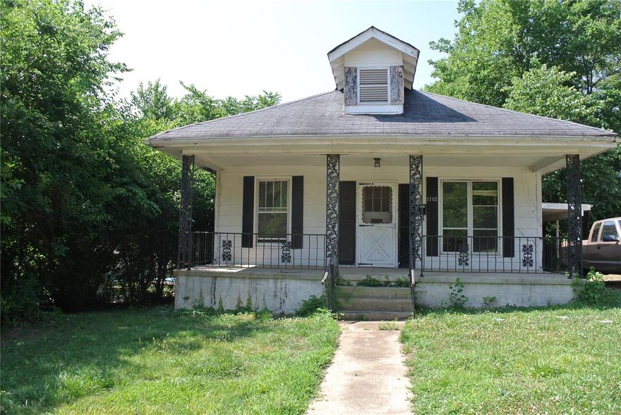 Large 2, could be 3 bed, 2 bath house sitting on a nice shaded corner lot. Home would be a great investment property or flip. House has covered parking and small storage shed.