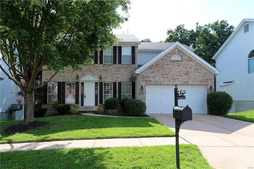 You will love this spacious 2-story home in Arbor Trails Subdivision with 2,900 sq. ft. of living space. Welcoming 2-story entry with hardwood floors opens to the living room which flows to the family room with bay window & gas fireplace. Elegant dining room for more formal dining & entertaining.  You will love cooking in your large kitchen w/ 42-in cabinets, many w/ pull-out shelves, center island w/ seating, pantry, planning desk and gleaming hardwood floors. The breakfast room opens to upper deck with a view of your private wooded lot. Upstairs is the large master suite with vaulted ceiling, wall of windows, large walk-in closet and luxury master bath with double bowls, separate tub & shower and ceramic tile floor. Generously-sized guest bedrooms. The walkout basement is just waiting for your finishing touches with a rough-in for a bath, four large windows, and a slider to the lower deck! Parkway Schools and close to highways, shopping, restaurants and more!