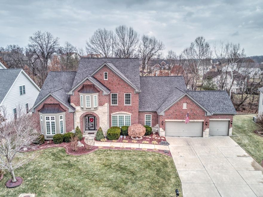 Beautiful 1.5 story home on a quiet cul-de-sac. Private lot backing woods. Premium brick and stone elevation. Two story entry foyer. Gourmet kitchen with granite countertops, upgraded cabinetry, center island, Thermador gas cooktop, dual wall ovens, and wine cooler. Floor to ceiling brick & stone see-through gas fireplace. Formal dining room with tray ceiling. Front office with built-ins. Luxury master suite with two walk-in closets and soaking tub. Finished walk-out lower level with wet bar, double sided gas fireplace, billiard area, surround sound media room, tray ceiling, and patio. Hardwood floors. Jack and Jill bathroom. Picture windows. Whole house speaker system with components and 26 built-in speakers ($26,000 cost). Large deck. Professional landscaping with in-ground sprinkler system. Finished three car garage. Ceiling fans. Crown molding. Security system. Main level laundry room. No children. No pets. No smoking. Furniture, appliances, rugs, and decor are negotiable.