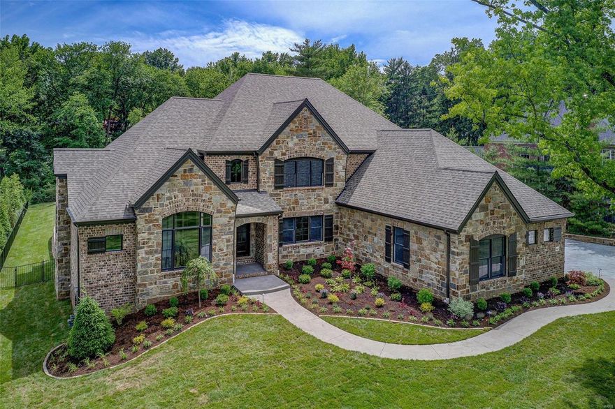 Another new custom home just completed by Dublen Homes on a small private, tree-lined cul-de-sac street in the heart of Ladue.  Situated on a beautiful, wooded .74-acre site, this four bedroom, 4.5 bath plan features approximately 5,300 square feet and is loaded with upgrades.  See attached FEATURES LIST!  Join several other newer homes in this sought after close-in location.  Convenient to highways, the airport, and Clayton. Additional Rooms: Mud Room