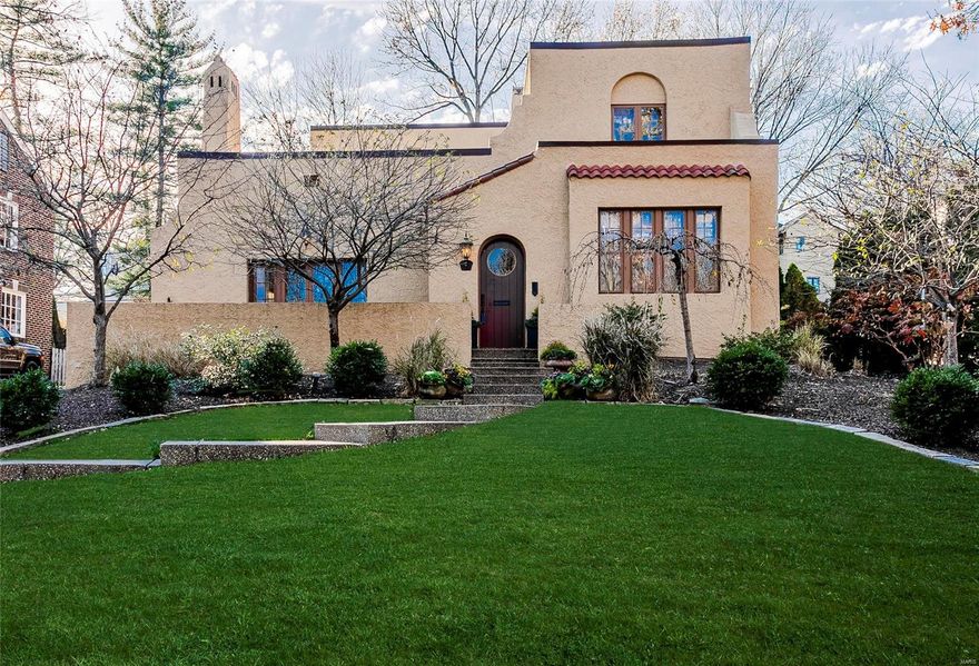 Situated in a prime location within coveted Claverach Park, this impeccable 1920's Spanish Colonial abounds with charm and modern amenities. On main level, gorgeous living room with gas fireplace & beamed ceiling, pretty dining room, family room with coffered ceiling & slate floor, center island cook's kitchen with high-end appliances, main floor laundry, powder room. Upstairs, luxurious master suite includes private bath with jet tub and custom shower and large closets. Three more bedrooms and two additional full baths. Basement rec. room. Fully fenced yard. Gleaming hardwood floors, beautiful millwork, tastefully updated throughout. Attached, heated & cooled showroom-style garage w/ California-style glass garage door, stained concrete floor, mudroom built-ins provides additional 480 square feet of finished living space should that be your preference...Has been sellers' pandemic schoolroom & gym since March! Property overlooks green and lush Hillvale island. You will adore this home!