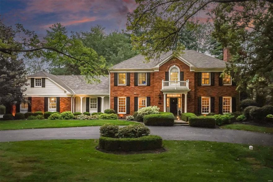 Exceptional craftmanship & distinctive design elements define this sophisticated 2-sty Georgian Colonial. Impressive entry foyer leads to elegant dining room & family room with lighted bookcase & floor-to-ceiling stone fireplace flanked by built-in cabinets. Step-down living room features marble fireplace & French doors that open to well-appointed study with cherry wall unit & 3rd fireplace. Designer kitchen with 42” gray cabinetry, granite countertops, commercial grade appliances & butler’s pantry adjoins light-filled breakfast room with breakfront & convenient planning center and private office. Oak staircase accesses coffered primary bedroom suite with 2 customized closets, dressing area & luxury bath with jetted tub plus 3 additional bedrooms & hall full bath. Lower Level entertainment space includes recreation room with 12’ oak bar, family room, game room & workout room. Situated on a .85-acre lot with paver patio with outdoor kitchen & pool surrounded by landscaped gardens.