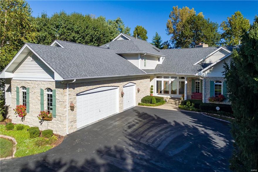 Ballas Lane is one of Town & Country's best kept secrets.  Only 18 families can call this established neighborhood home, while fewer still are lucky enough to back to Neuwoehner School.  We even have a bridge to lead the way!  Its proximity to upscale shopping, fine dining, prestigious schools, major highways and hospitals make it the ideal location for anyone residing in St Louis.  This custom home was designed with an eye for both entertaining and everyday lifestyle.  A truly open concept defines the main level with the expansive kitchen serving as its heart and soul.  Custom cabinetry, over-sized center island, granite counter tops, luxury appliances and slate flooring create a gourmet kitchen worthy of the chef in your life.  Its completely open to the Great Room, can accommodate a dining room table for all of your guests, and of course, connects to the Hearth Room, which overlooks the pool and walks out to the covered deck. Main floor master suite, wine cellar, too much to list... Additional Rooms: Mud Room