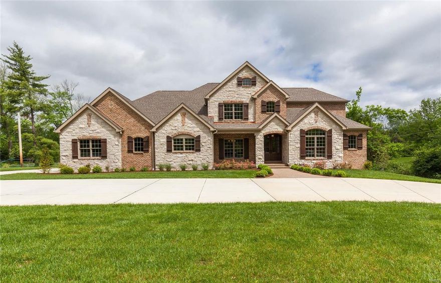 HUGE price reduction gives your clients an opportunity to purchase a one of a kind stunner! Experience peaceful tranquility! With beautiful hand scraped 7" plank dark hardwood floors, unbelievable attention to detail and exceptional mill work and moldings at every turn. The vaulted ceiling in the study/office has a unique, gorgeous plank ceiling. The kitchen is exceptional with custom cabinets, quartz countertops, oversized island, 48" Viking 8 burner dual fuel range, a 42" Viking refrigerator, and Viking dishwasher and microwave and so much more! The master has custom his/hers closets and a to die for bath with fabulously large shower. The upstairs has three bedrooms all with en-suite baths and a bonus room. The lower level has an additional bedroom, one and a half baths, huge rec space and an additional bonus room. Similar custom and spec homes along Clayton Rd. selling for approximately $500k more. MUST SEE!  Motivated seller. Additional Rooms: Mud Room