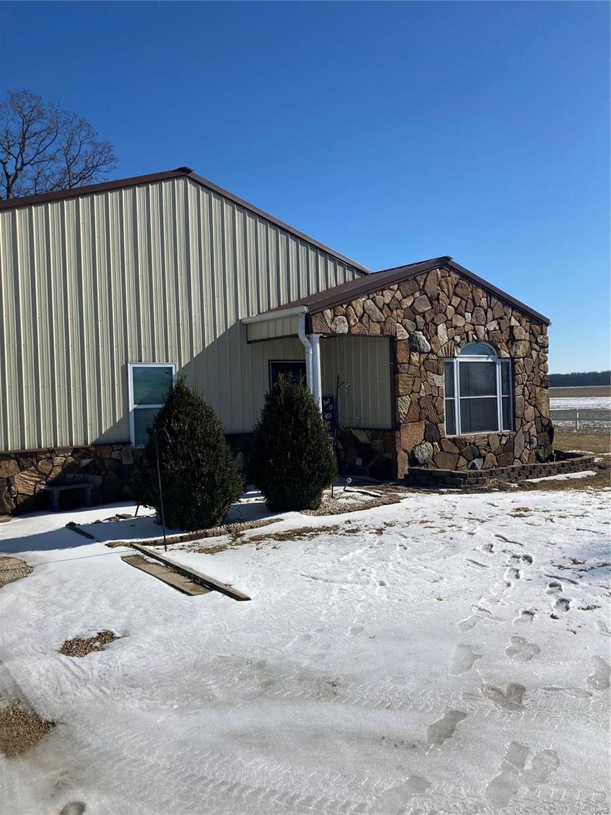 Very nice two bedroom two bath home in the country with attached garage and shop building with one bedroom apartment upstairs. House is setting on 1.49 acres and with a above ground pool with a deck.