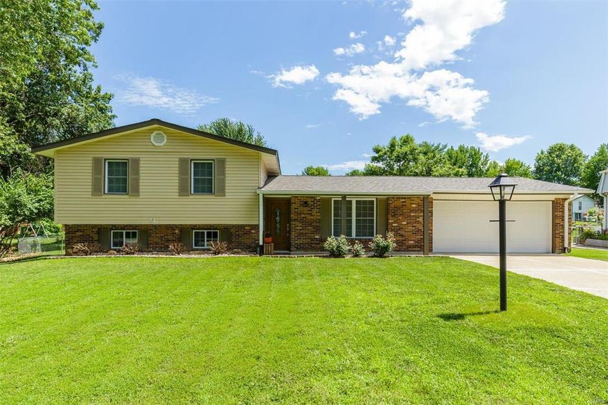 Perfect St Charles County location in St Peters City just between Hwy 70 & Hwys 94/364 access. Beautifully renovated Tri-Level home on a quiet street in a small established neighborhood. From the new roof to the finished lower level w/ full bath, this home has been completely updated to look new. Kitchen has been redesigned to include new custom cabinets, ceramic tile countertops, double basin solid surface sink, designer tile backsplash, wood floors, stainless appliances. Spacious living room, 3 good sized bedrooms and large family room w/ brick wood burning fireplace, all w/ new textured carpeting, new woodwork, freshly painted ceilings & walls.
2 full bathrooms completely renovated w/new vanities, solid surface sinks,  fixtures, ceramic tile floors. All new tilt in windows, interior & exterior doors, new electric water heater, newer HVAC. Vinyl siding, soffit/fascia add to the curb appeal. Enjoy the  large covered patio and huge fenced in yard. Garage is oversized and dry walled.